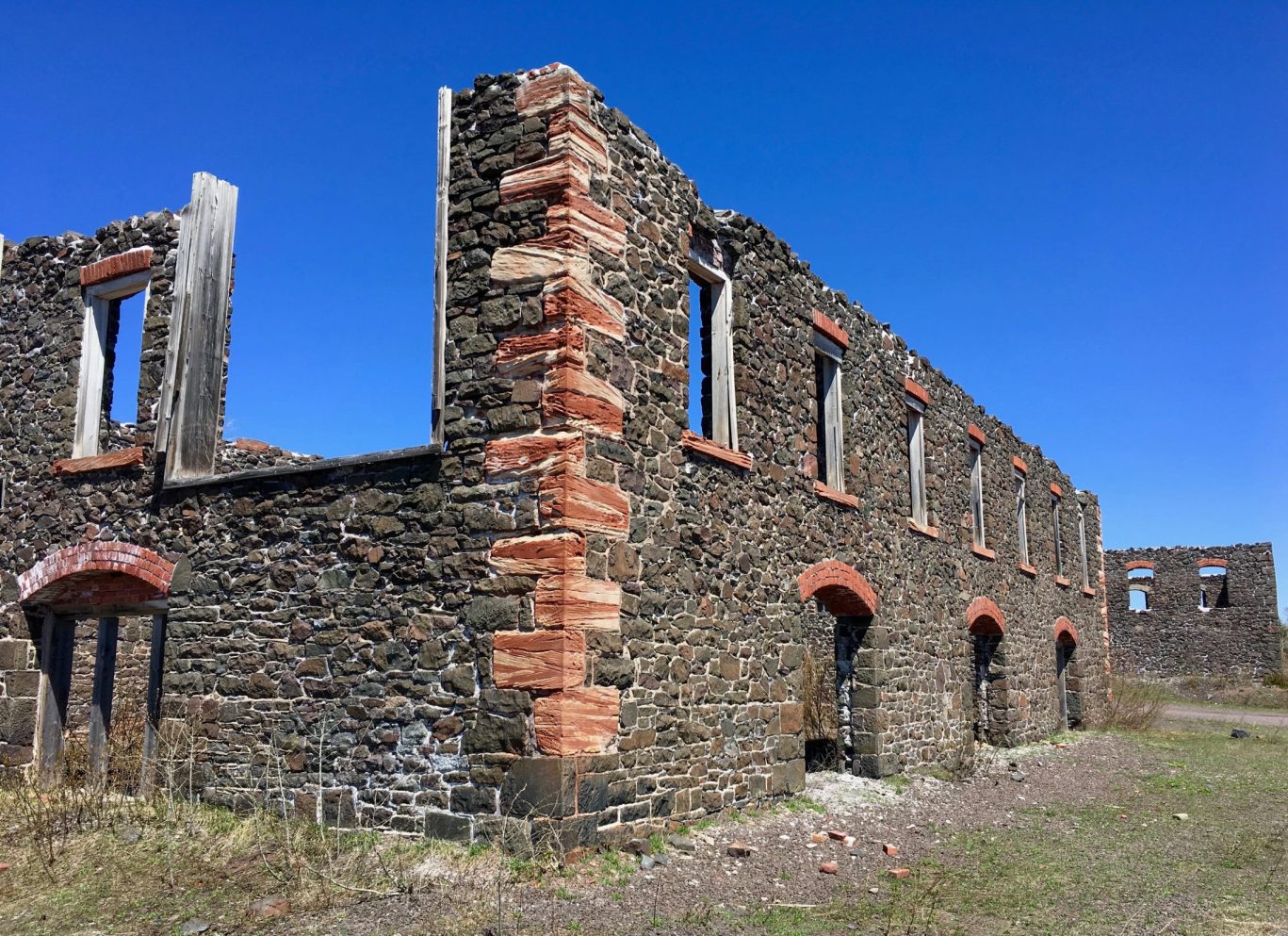 Ruins of a historic stone building in Hancock, Michigan, near Magnuson Hotel Copper Crown.