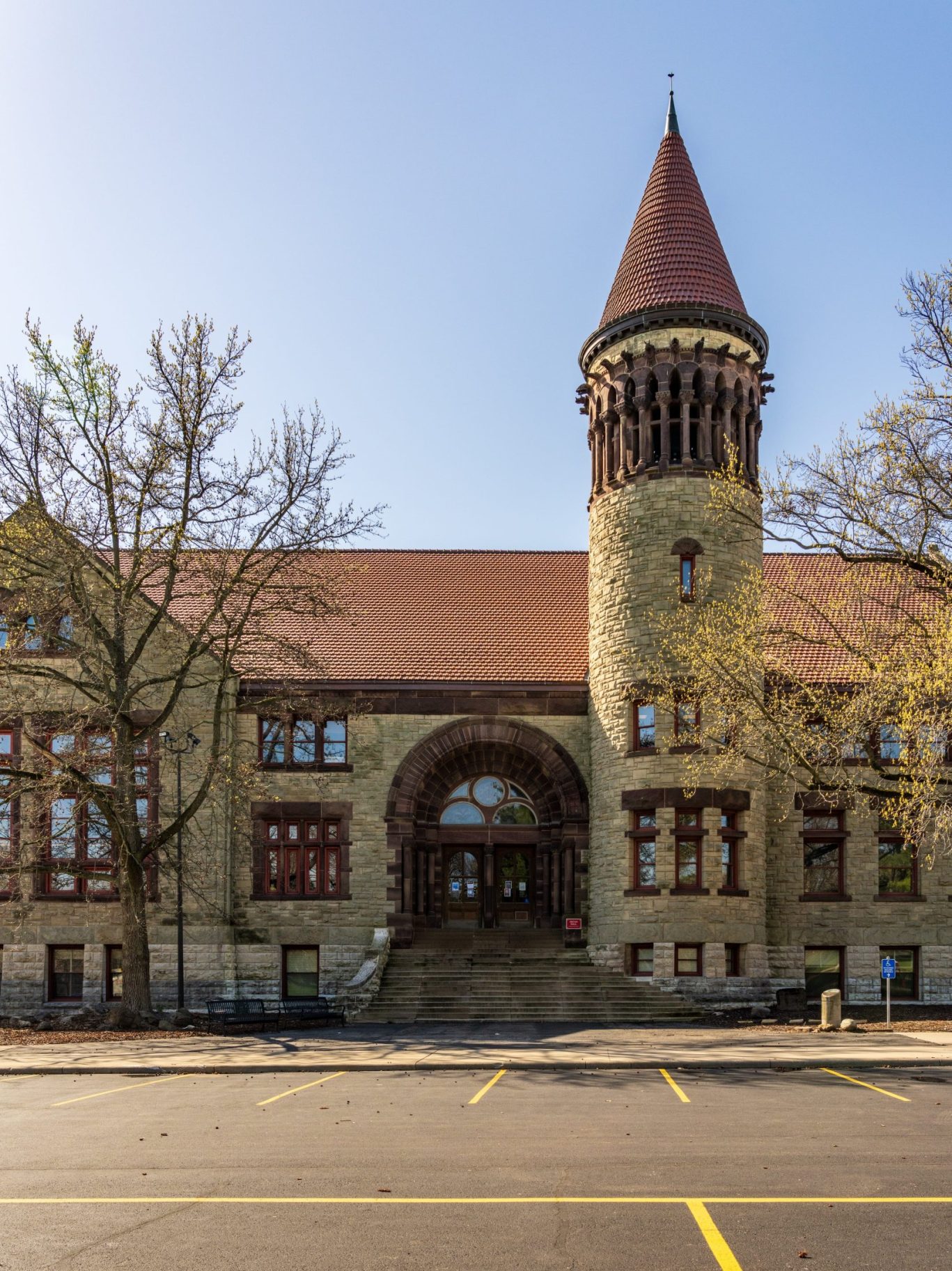 Historic building with round tower and arched entrance at The Ohio State University in Mansfield.