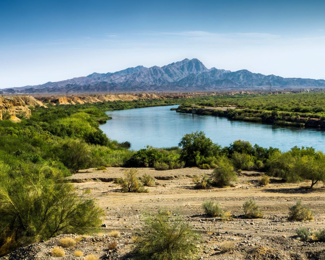 Scenic view of the Colorado River with mountain backdrop near Blythe, California.