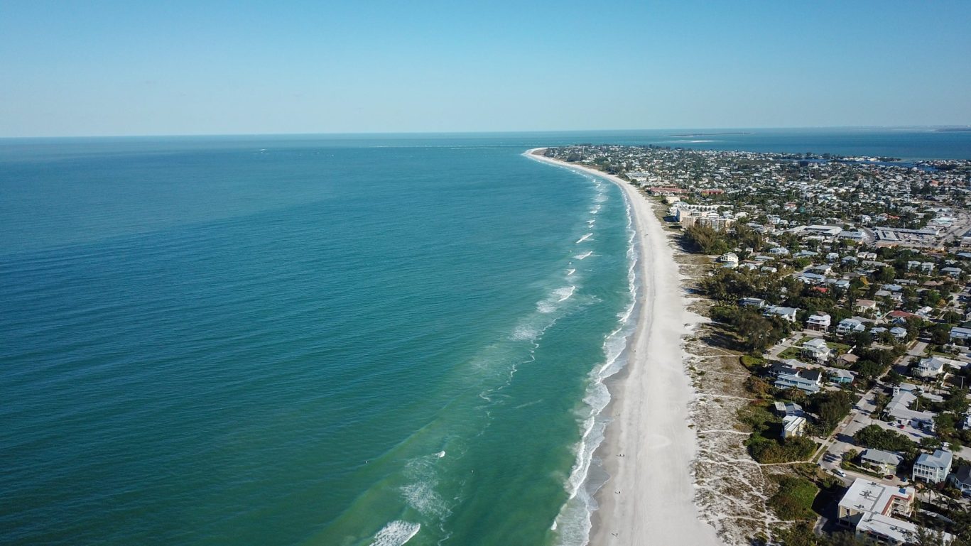 Aerial view of Florida Gulf Coast beach near Magnuson Hotel.