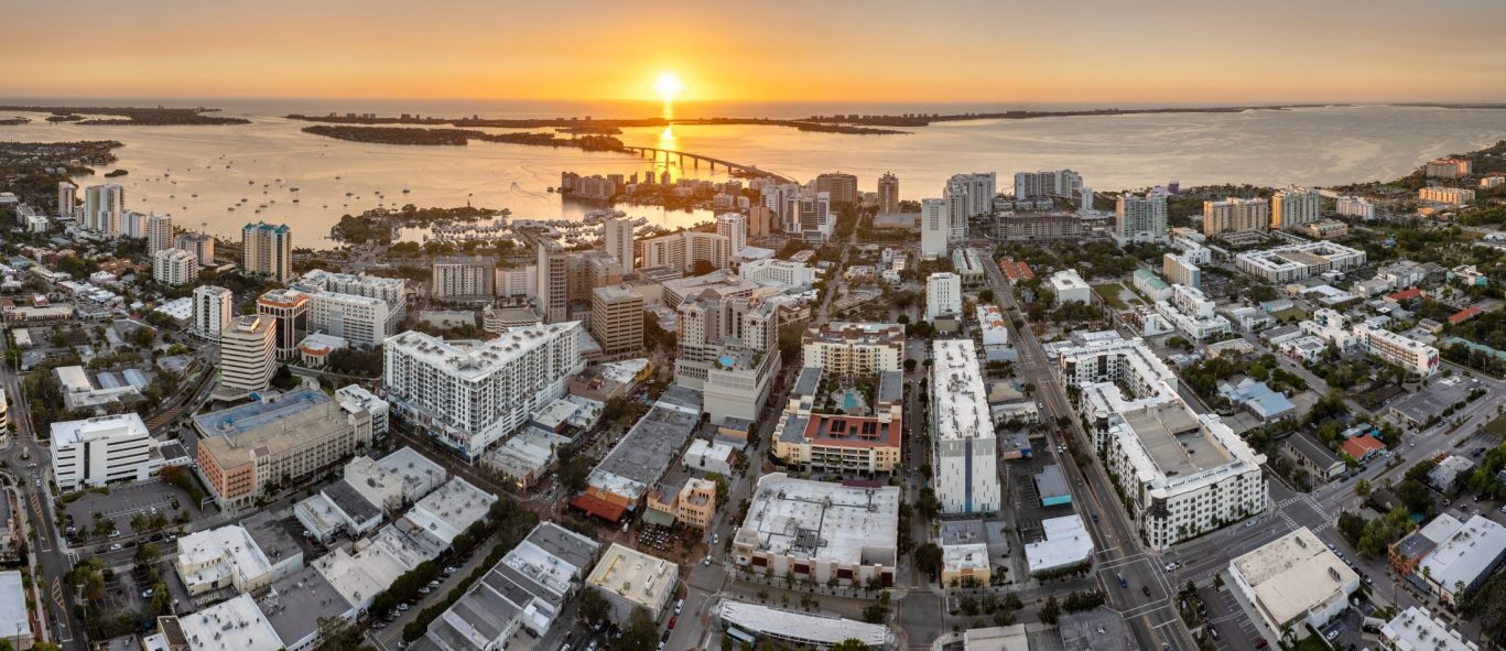 Downtown Sarasota city skyline at sunset overlooking the bay.