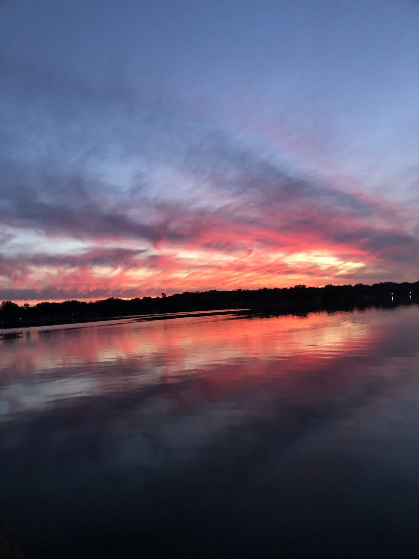 shutterstock_2555675473 – Sunset Lake Shot in Howell Michigan