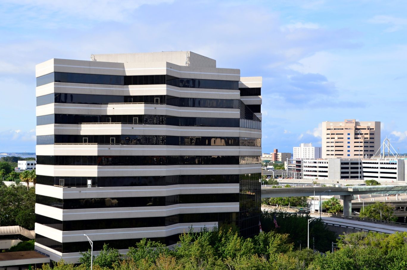 Modern office towers and downtown skyline view in Jacksonville, Florida near hotel location.